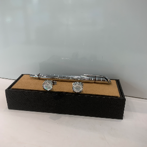 Cuff links and pen